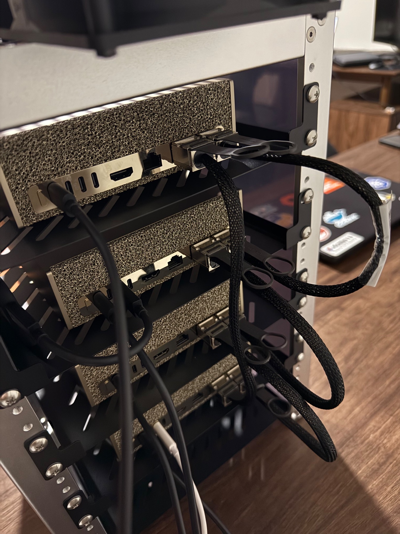 Four DGX Sparks wired as a physical ring. Each Spark has one direct cable to each neighbor.
